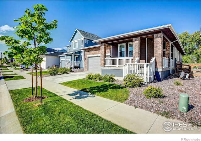 view of front of property with a porch and a front yard