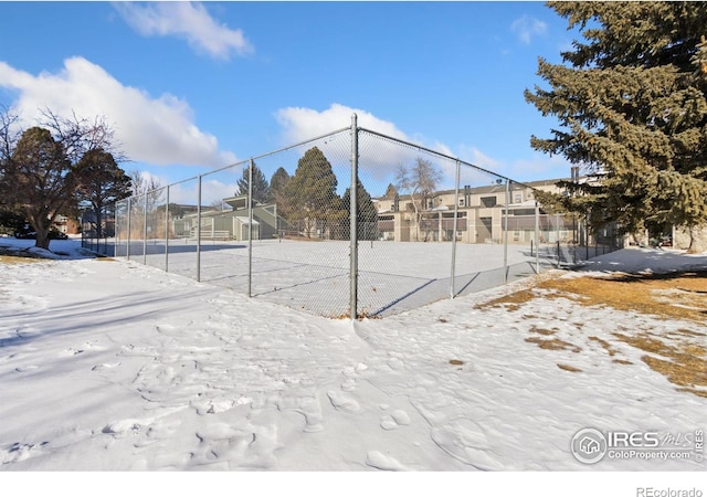 view of yard layered in snow