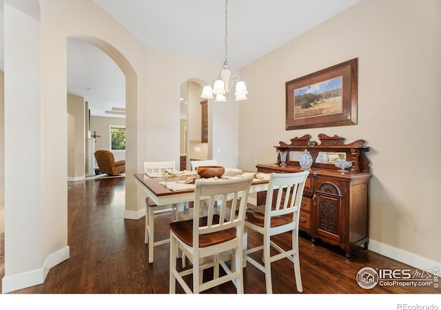 dining area with dark wood-type flooring