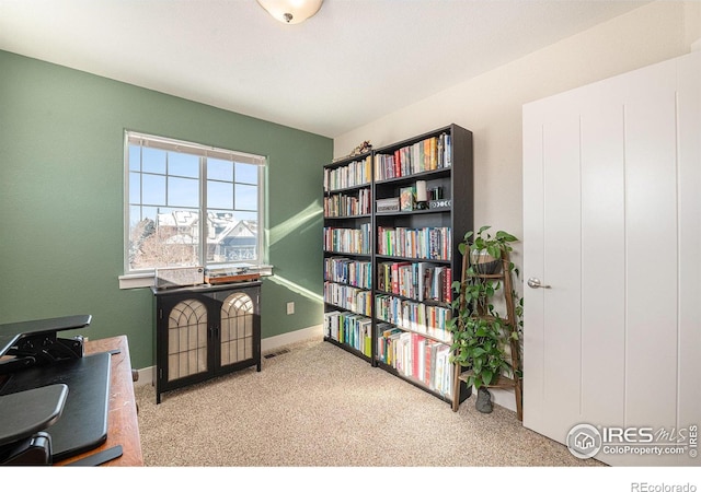 home office featuring light colored carpet