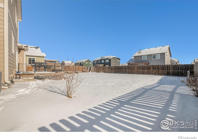 view of snowy yard