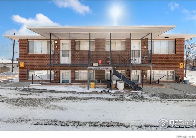 920 N Douglas Ave, Loveland, CO 80537 - view of snow covered rear of property