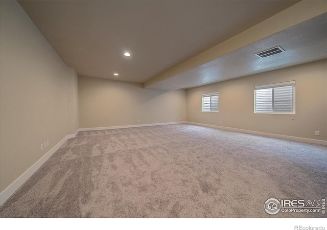 basement with carpet flooring