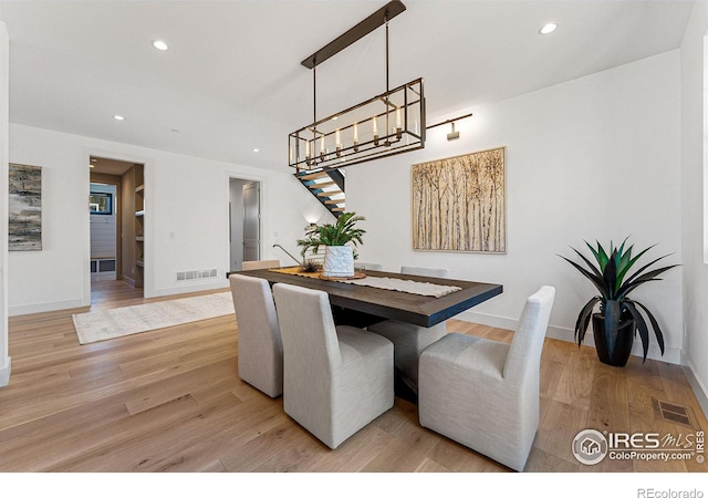 dining space featuring light hardwood / wood-style flooring