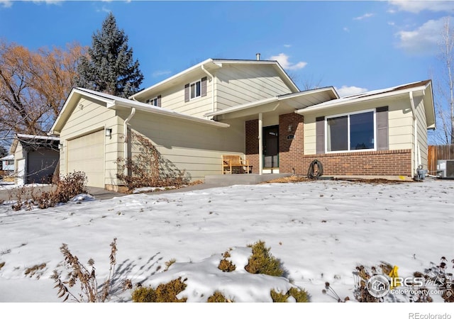 split level home featuring a garage