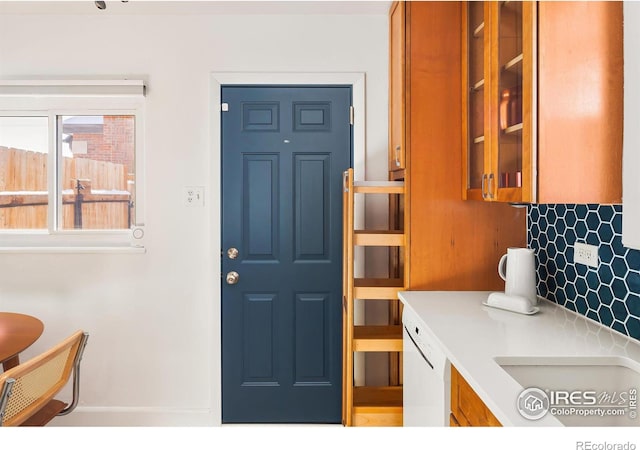 interior space with decorative backsplash