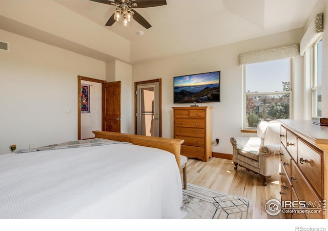 bedroom with light hardwood / wood-style floors and ceiling fan