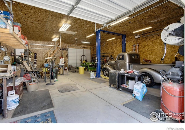 garage with a workshop area