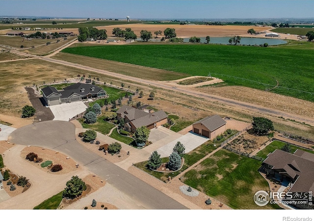 bird's eye view featuring a water view and a rural view