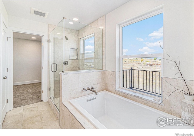 bathroom with independent shower and bath