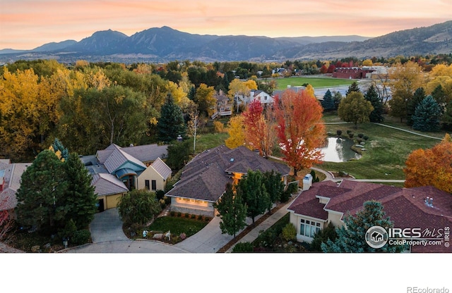 aerial view at dusk with a mountain view