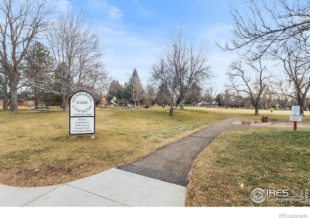 view of home's community featuring a yard