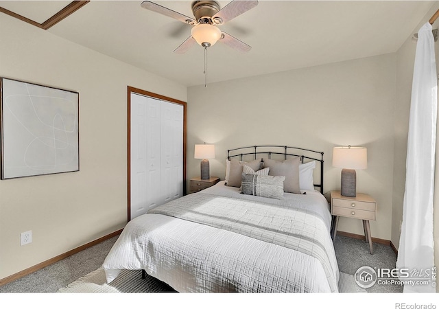 bedroom with light carpet, ceiling fan, and a closet