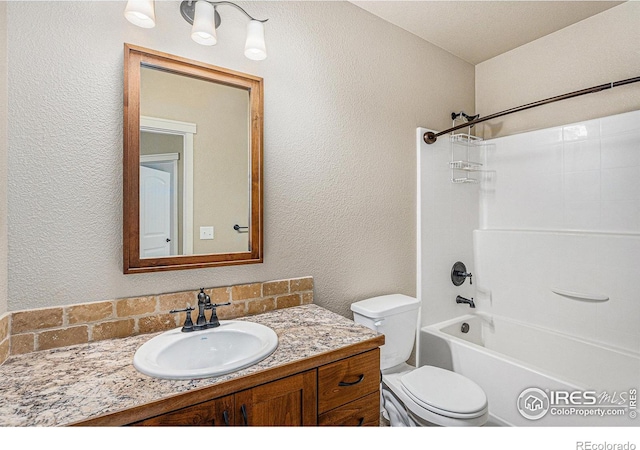 full bathroom featuring vanity, toilet, and shower / bathing tub combination