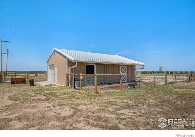 exterior space with a rural view