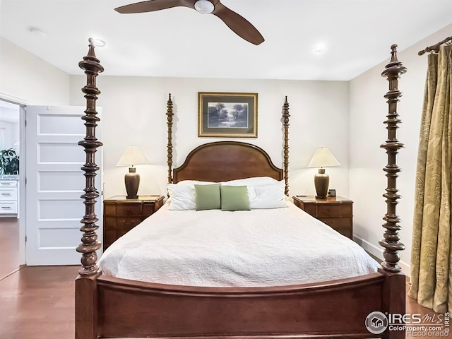 bedroom with hardwood / wood-style flooring and ceiling fan