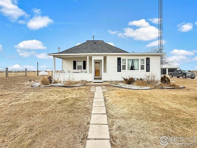 view of front of property with a front lawn