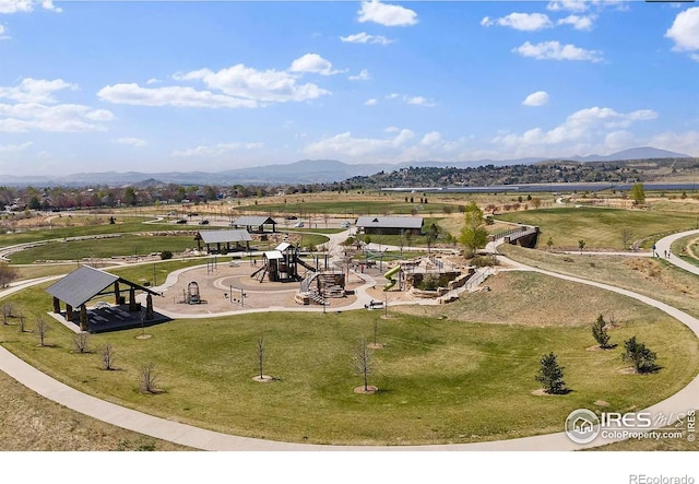 birds eye view of property featuring a mountain view