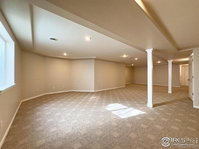 basement with light colored carpet