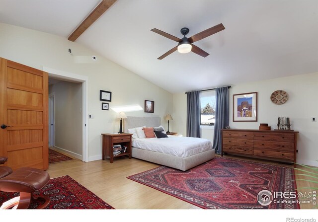 bedroom with light hardwood / wood-style flooring, lofted ceiling with beams, and ceiling fan