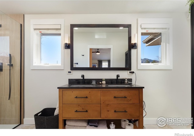 bathroom with vanity and an enclosed shower