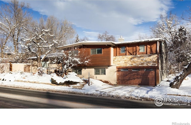 view of front of home with a garage