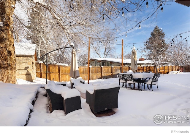 view of yard covered in snow