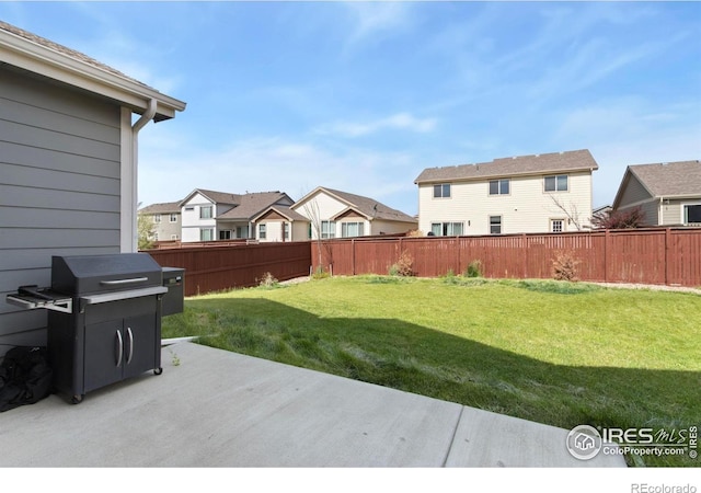 1484 First Light Dr, Windsor, CO 80550 - fenced backyard featuring a residential view and a patio area