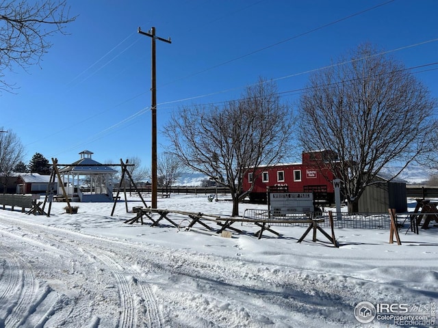 view of yard covered in snow