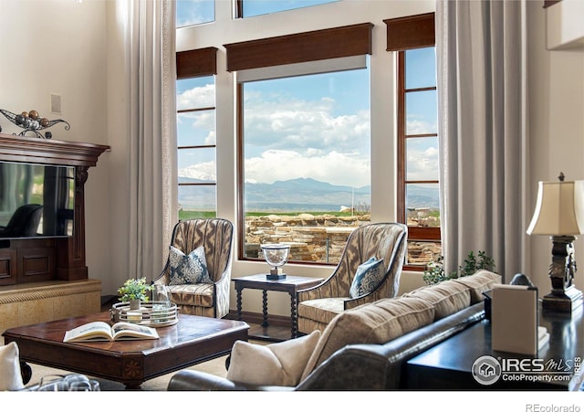 living room featuring a mountain view