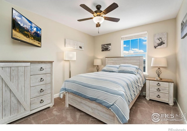 bedroom featuring dark colored carpet and ceiling fan