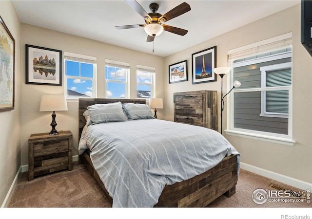 bedroom featuring ceiling fan and carpet flooring