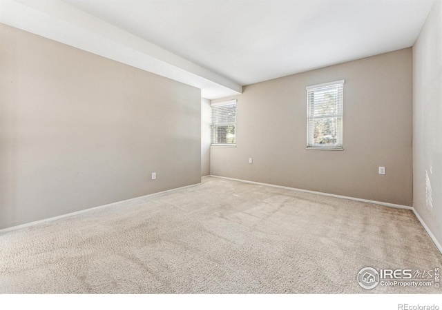 view of carpeted spare room