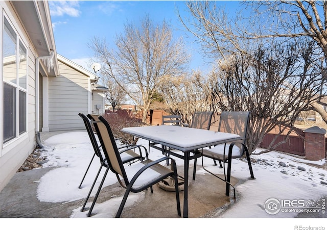 view of snow covered patio