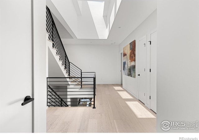 foyer entrance featuring light wood-type flooring