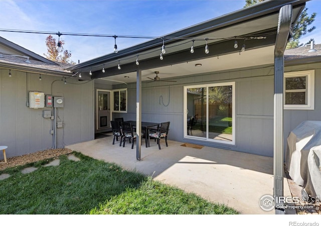 view of patio featuring ceiling fan and outdoor dining space