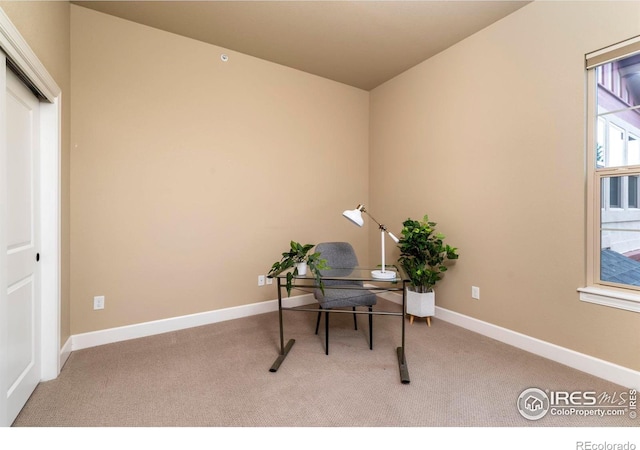 office area with light colored carpet