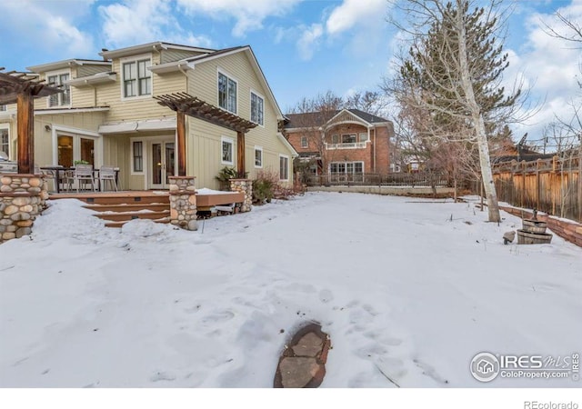 view of snow covered property