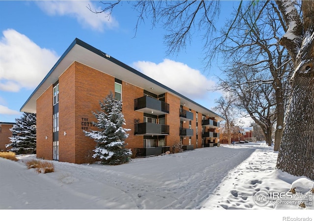 view of snow covered building