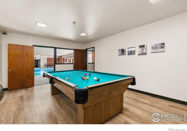 game room featuring billiards and light wood-type flooring