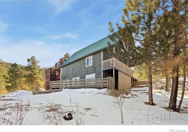 view of snow covered property