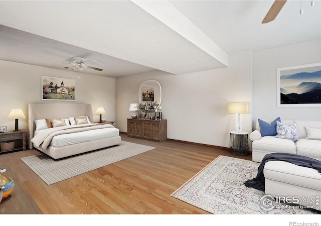 bedroom featuring hardwood / wood-style flooring and ceiling fan