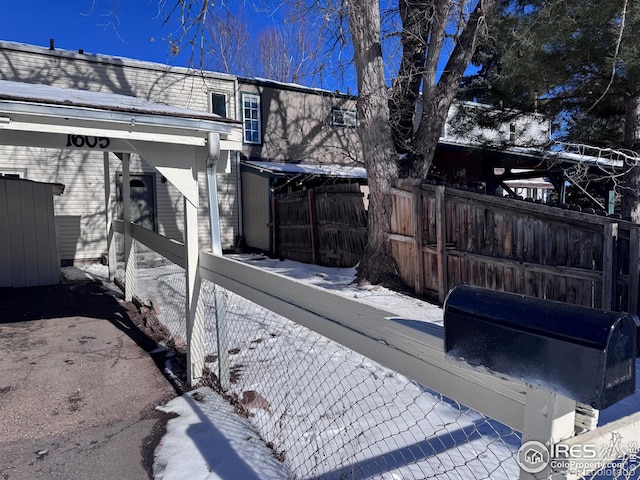 view of snow covered property