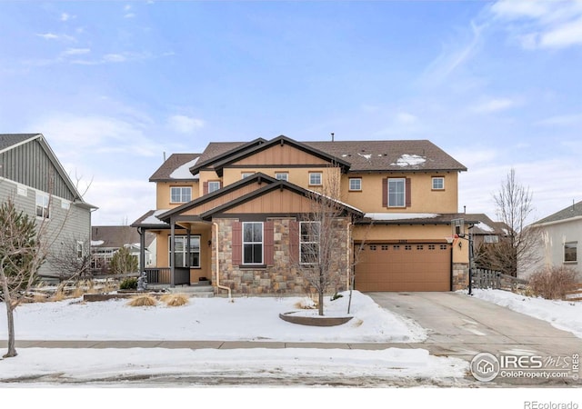 craftsman house with a garage