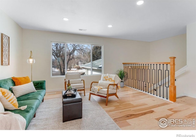 living room with hardwood / wood-style flooring