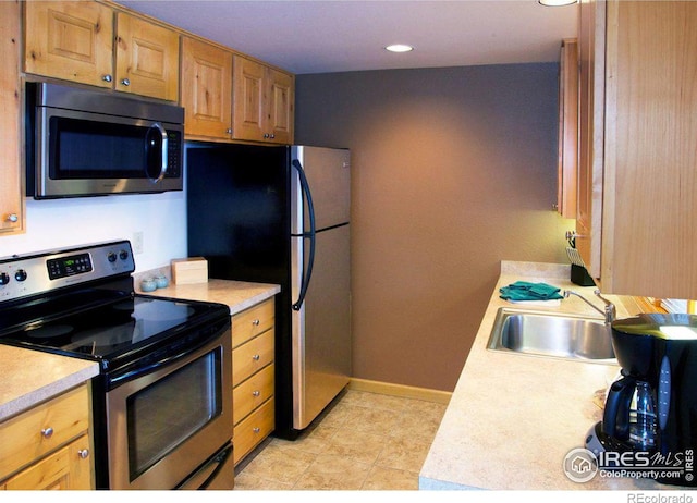 kitchen featuring sink and stainless steel appliances