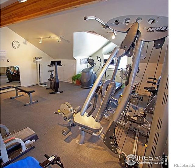 exercise room with lofted ceiling