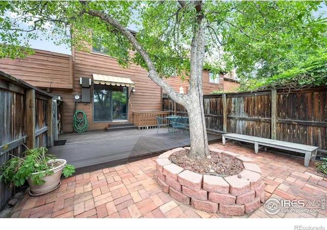 view of patio with a wooden deck