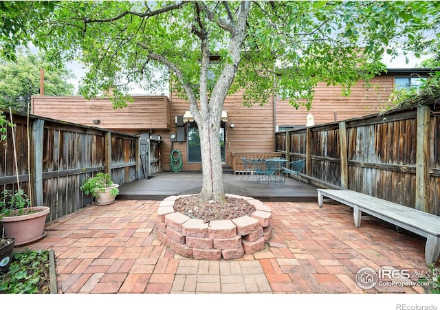 view of patio featuring a deck