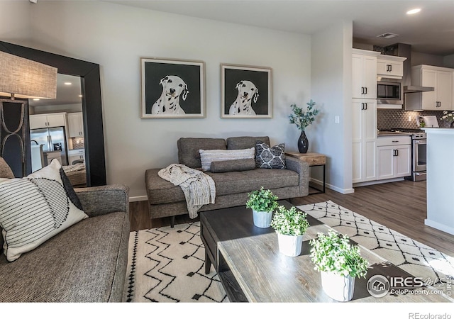 living room with dark wood-type flooring